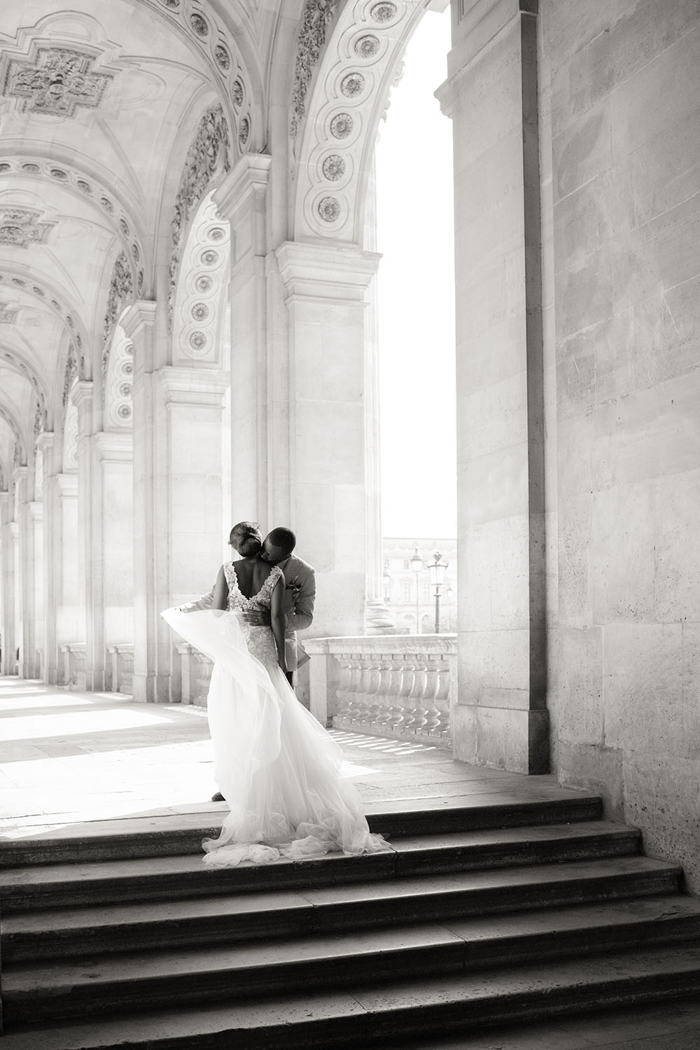 bride and groom hugs